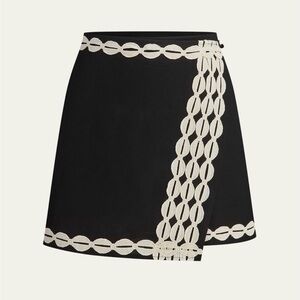 Chic Black Mini Skirt with White Lace Detail